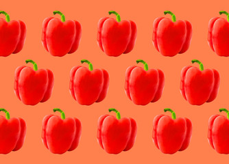 Colorful pattern of sweet red pepper. Coral background