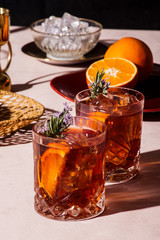 Negroni, an Iba cocktail, with 1/3 gin, 1/3 bitter, 1/3 vermut, in luxury pop style, rich and...