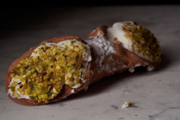 Close up of a Sicilian cannolo