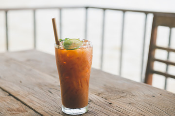 Ice cold sweet lemon tea drink.