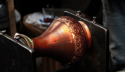 Making process of traditional copper handicraft in Gaziantep.