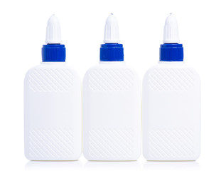 Bottles of glue on white background isolation