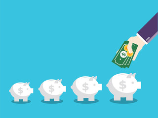 Business hand insert money and coin into the piggy bank.