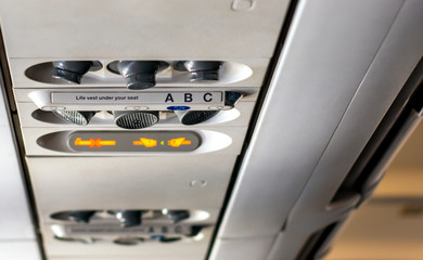 Control panel inside a flight cabin of an airplane