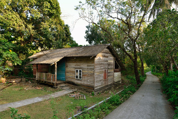Fototapeta na wymiar Old wooden house of an islanders Long Island, Andaman and Nicobar Islands, India