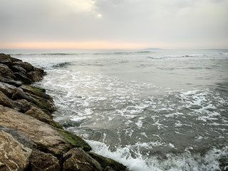 Breakwaters Made Of Rock Breaking Sea Waves