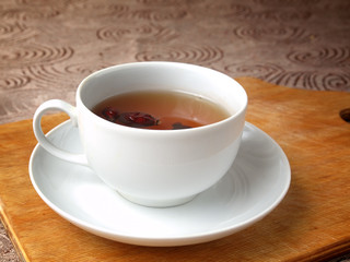 OLCup of tea from dried rose hips