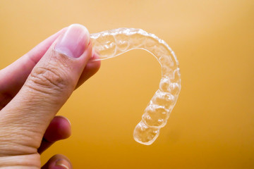 Invisalign retainer teeths, it's a equipment for orthodontist give the patient to orthodontic surgery in dental clinic or hospital - obrazy, fototapety, plakaty