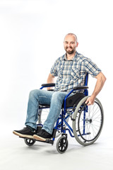 Fototapeta na wymiar smiling man on wheelschair