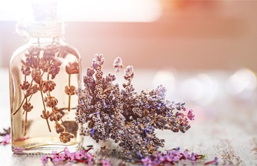 Lavender flowers and glass bottle isolated