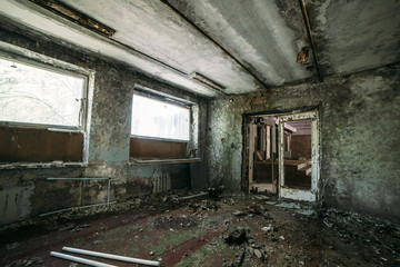 Fototapeta na wymiar Inside the hotel in abandoned Pripyat city in Chernobyl Exclusion Zone, Ukraine