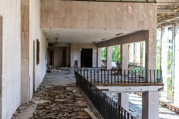 Ruin in foyer of Energetik Palace of Culture, dead abandoned ghost town of Pripyat in Chernobyl nuclear power plant alienation zone, Ukraine