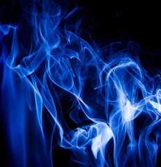 Blue smoke on black background