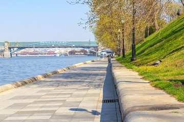 Embankment by the river on a Sunny day