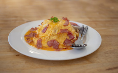 food design omlet egg with bacon as lava