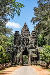 Amazing face sculptures on the gateway at the Angkor Thom temple complex in Siem Reap, Cambodia
