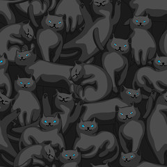 Seamless pattern with cartoon black cats.