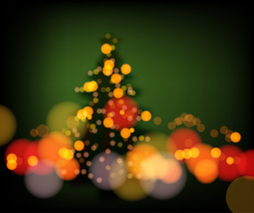 Obraz na płótnie Canvas Christmas background with blur glowing lanterns and holiday fir tree.