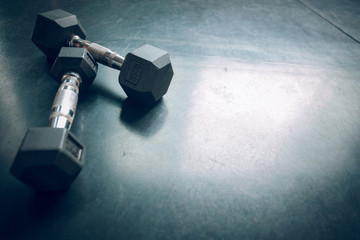 Dumbells on the floor in a gym