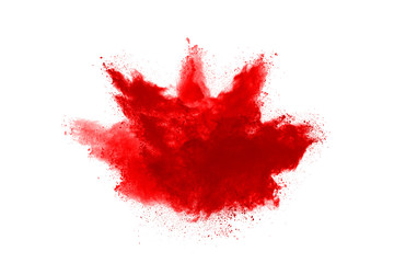 Freeze motion of red powder exploding, isolated on white background. Abstract design of red dust cloud. Particles explosion screen saver, wallpaper
