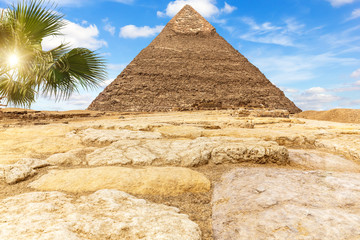 Fototapeta na wymiar The Pyramid of Khafre Chephren in the sunny desert of Giza, Egypt