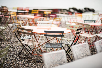 Chairs and tables for cafe on the beach