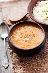 Kapustnyak - traditional Ukrainian winter soup with sauerkraut, millet and meat