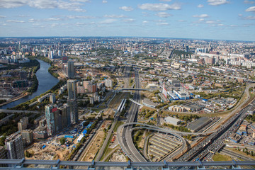 The view from the observation deck of Moscow. Top view of Moscow city. Summer in the city, sky and clouds.