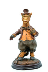 Statue of a funny standing horse. Figurine of a horse in a suit and with a clock. White background, isolate.