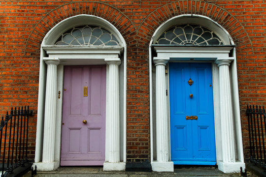 Fototapeta Georgian architecture and painted house doors with red brick facade in Dublin city centre  Dublin, Leinster, Ireland