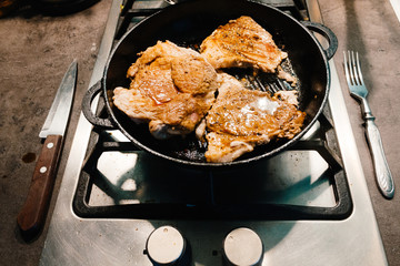 Close Pan View of Cooking Red Meat