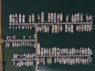 Aerial view of yachts in marina that is a symbol of luxury summer 