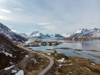Road along the fjord and connecting island in Lofoten, Norway