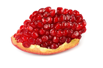 piece of pomegranate with seeds isolated on a white background