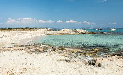 Fototapeta na wymiar Espalmador island. A tiny Balearic island that lies between Ibiza and Formentera with beautiful natural sandy beach. Spain.