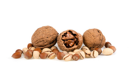walnut, hazelnut and pistachio on a white background