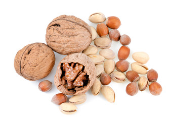 walnut, hazelnut and pistachio on a white background