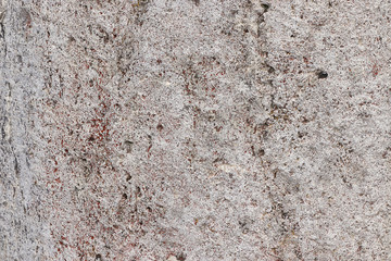 Natural marble background, natural natural texture of an ancient stone. It is used for finishing buildings and embankments, a fine background for a desktop and for photodesign