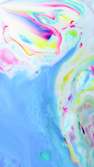 Fluid art. Multicolored abstract background on the liquid. Color pattern in the style of pop art. Multicolored fluid stains. Widescreen