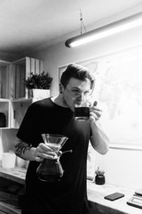 Freshly Brewed Single Origin Roasted Coffee Blooming and Brewing in Glass Chemex Vase