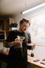 Freshly Brewed Single Origin Roasted Coffee Blooming and Brewing in Glass Chemex Vase