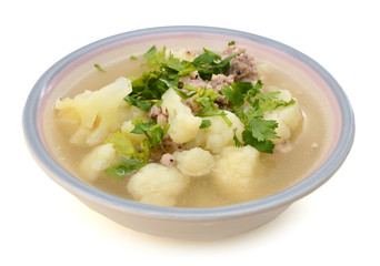 Fresh vegetable soup on white background