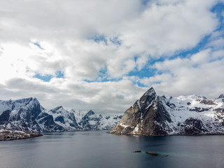 Hamnoy fishing villages with mountains in the background, Lofoten Norway.