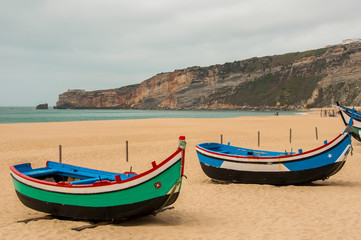Fototapeta na wymiar Landscape of the beautiful beach of Nazareth, Portugal