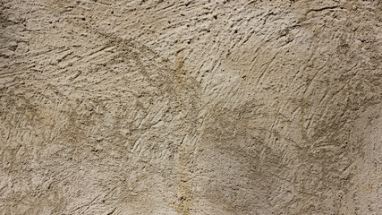 Background of the old wall. Texture of stone surface. Abstract background in retro style. Brown surface of solid material