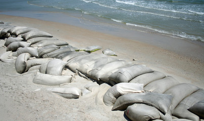 Sand bags along the beach