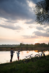 Family bike ride at sunrise