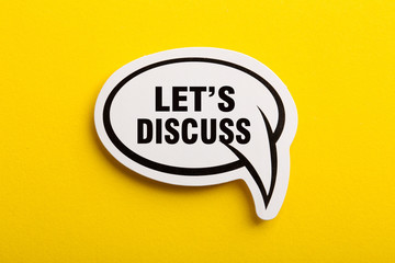 Let Us Discuss Speech Bubble Isolated On Yellow Background