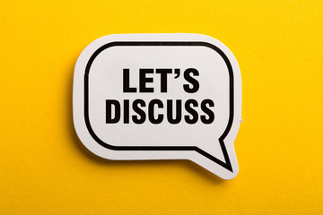 Let Us Discuss Speech Bubble Isolated On Yellow Background