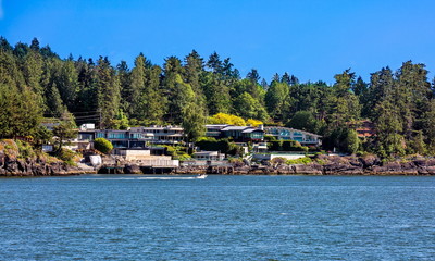 Naklejka premium The village is on the shore of the bay on the wooded slope of the suburb of West Vancouver. Horseshoe Bay West Vancouver British Columbia, Canada